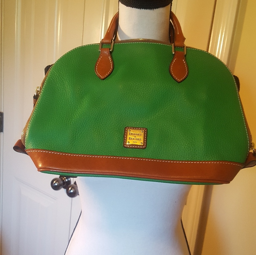 Green and tan Dooney and Bourke handbag